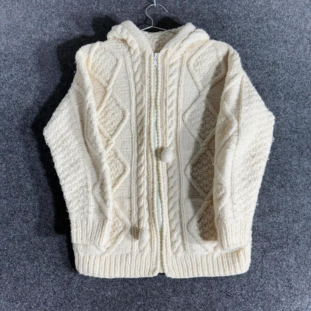 Hand-knit cream Aran sweater hoodie with chunky cable knit + tassel zip pulls